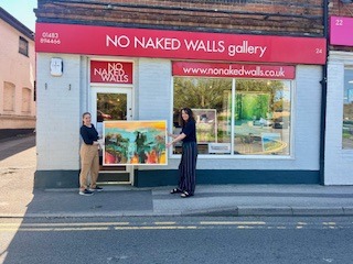 Photo of artwork outside No Naked Walls Gallery